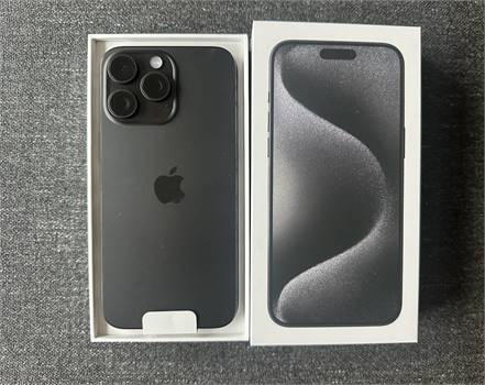 Apple iPhone 15 Pro Max 1TB Black Titanium in hand. Unlocked