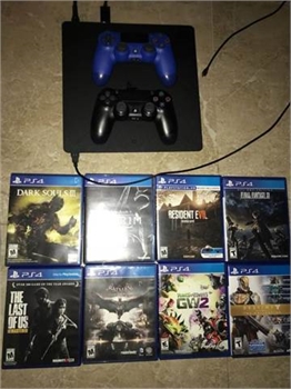  PS4 with 8 games 2 remotes