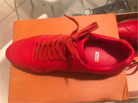  Pair of red Louis Vuitton 